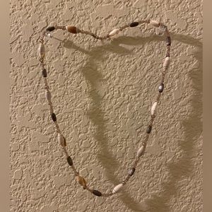 Bright purple beaded shell necklace